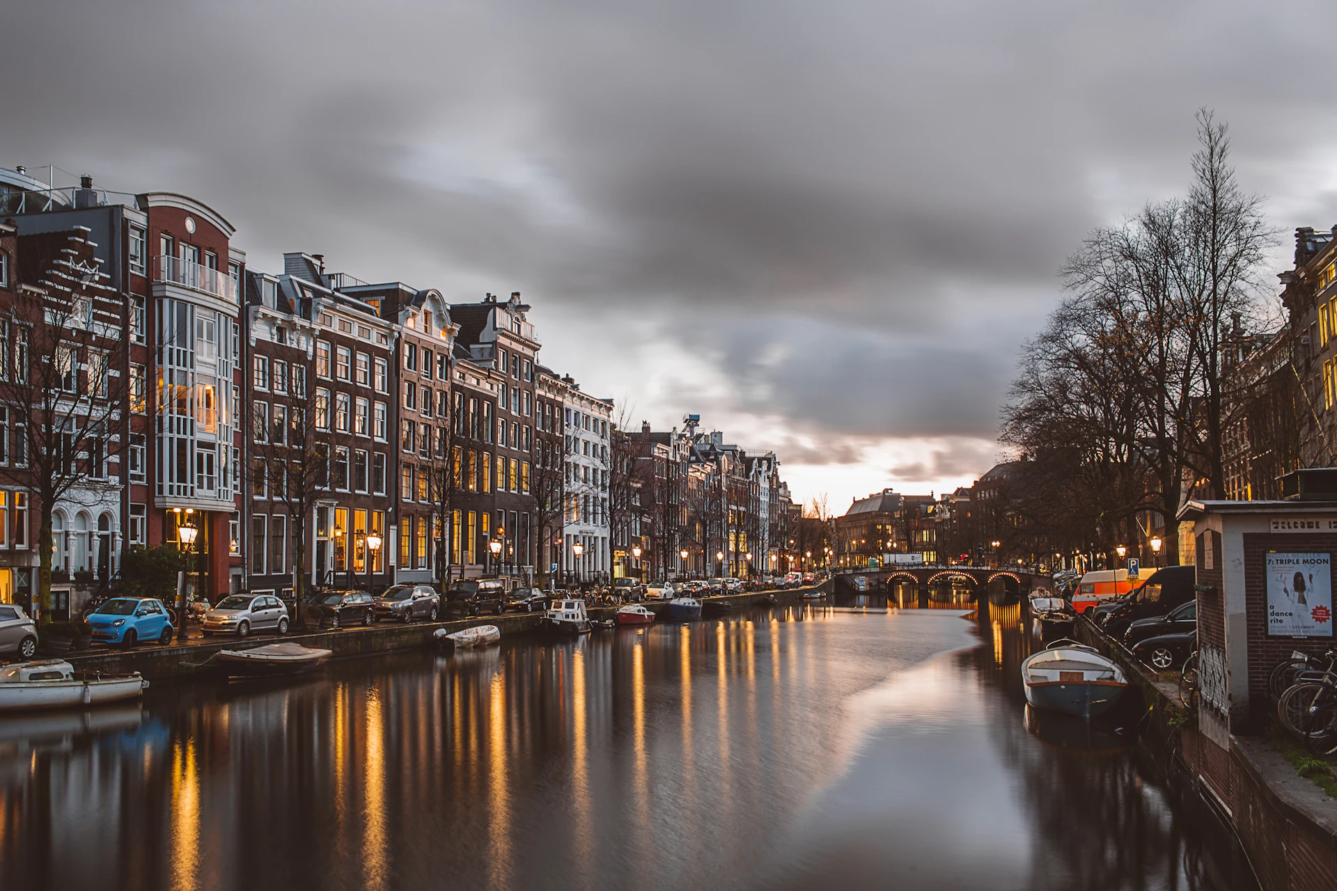 A canal in central Amsterdam at dusk